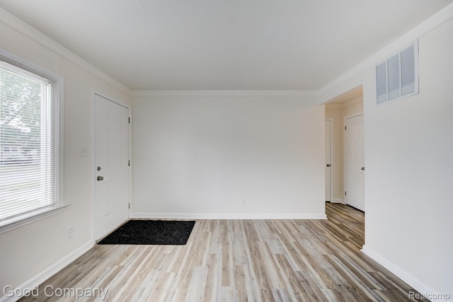 22811 Sharrow Ave, Utica, MI 48089 - entrance foyer with wood finished floors and crown molding