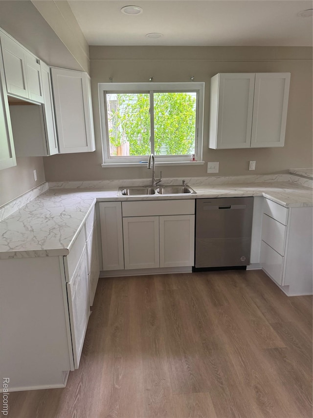 4227 Crooks Rd, Fenton, MI 48073 - kitchen featuring dishwasher, a sink, white cabinetry, wood finished floors, and light countertops