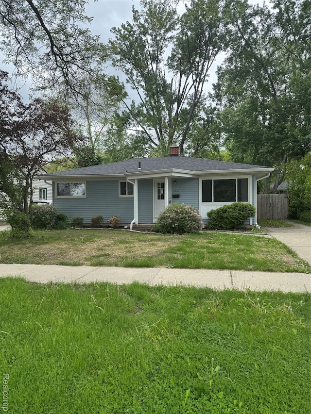 4227 Crooks Rd, Fenton, MI 48073 - ranch-style house featuring a chimney