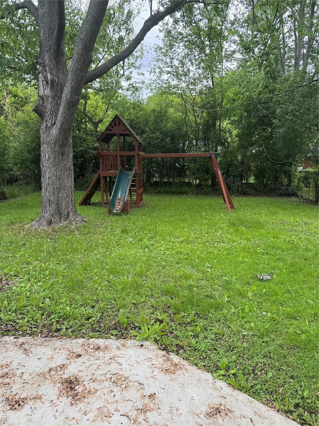 4227 Crooks Rd, Fenton, MI 48073 - view of green lawn featuring a playground