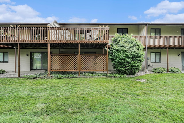 3431 Brookview Ct, Hudsonville, MI 49426 - back of property with a deck and a lawn