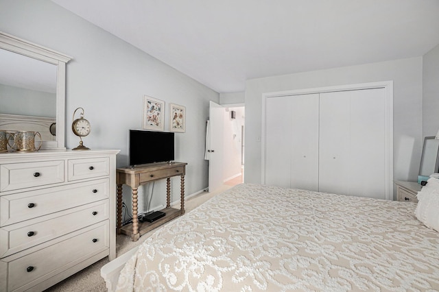 3431 Brookview Ct, Hudsonville, MI 49426 - bedroom with a closet, baseboards, and light carpet