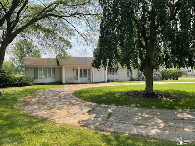 4845 E Dunbar Rd, Monroe, MI 48161 - single story home featuring a front yard and curved driveway