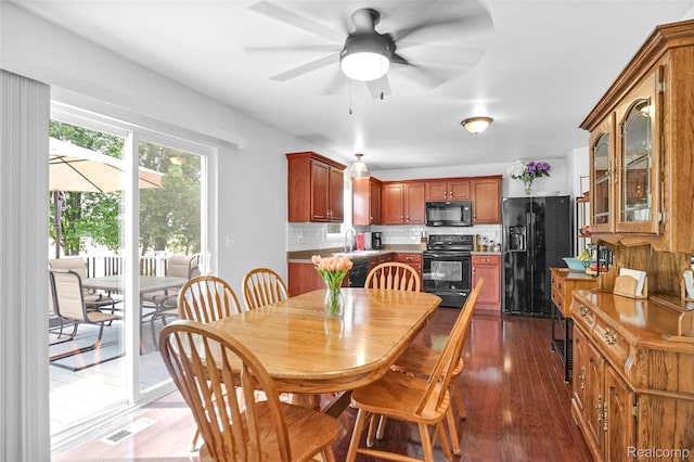 1029 Primrose Ln, Milan, MI 48160 - dining room with dark wood finished floors and a ceiling fan