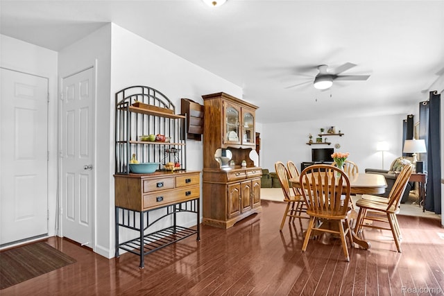 1029 Primrose Ln, Milan, MI 48160 - dining space with a ceiling fan and dark wood-style floors