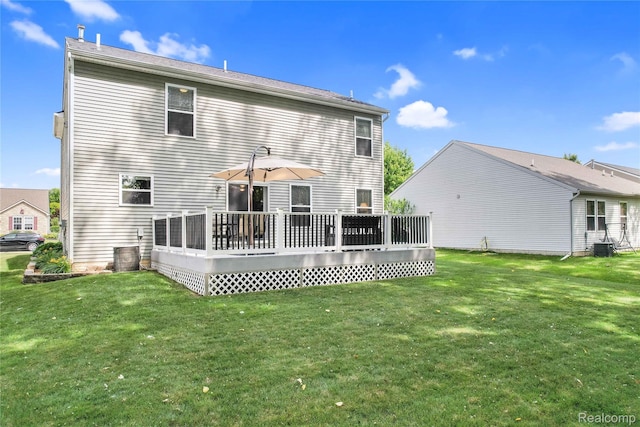 1029 Primrose Ln, Milan, MI 48160 - rear view of property with a yard and a wooden deck