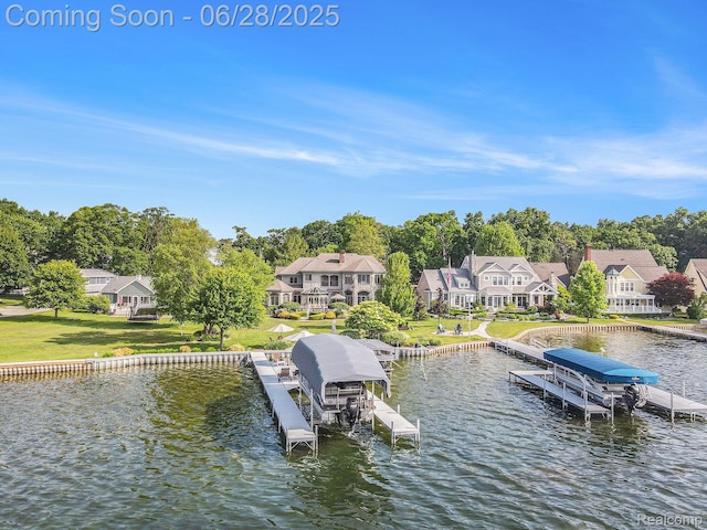 13123 Log Cabin Pt, Fenton, MI 48430 - dock area featuring boat lift, a water view, a residential view, and view of scattered trees