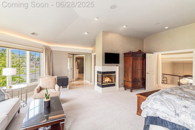 13123 Log Cabin Pt, Fenton, MI 48430 - bedroom with lofted ceiling, light carpet, and a multi sided fireplace