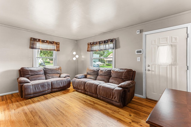 7491 Dacosta, Redford, MI 48239 - living room with light wood-style flooring, plenty of natural light, baseboards, and crown molding