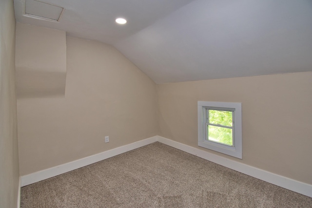 8974 M-140, Berrien Center, MI 49102 - additional living space featuring lofted ceiling, carpet flooring, and recessed lighting