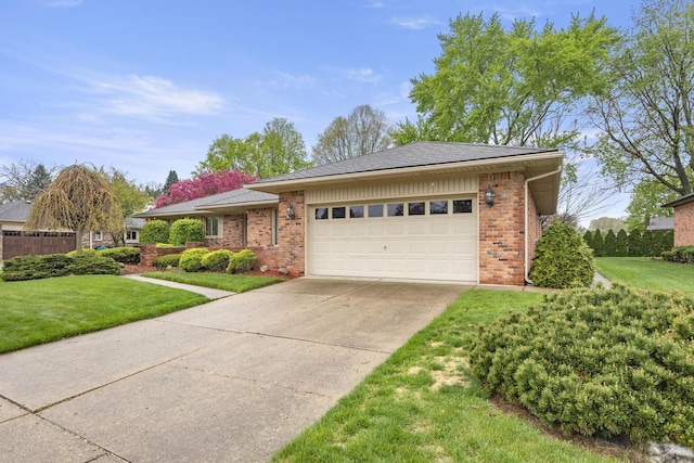 47545 Andrea Ct, Michigan, MI 48315 - ranch-style home with brick siding, a garage, and concrete driveway