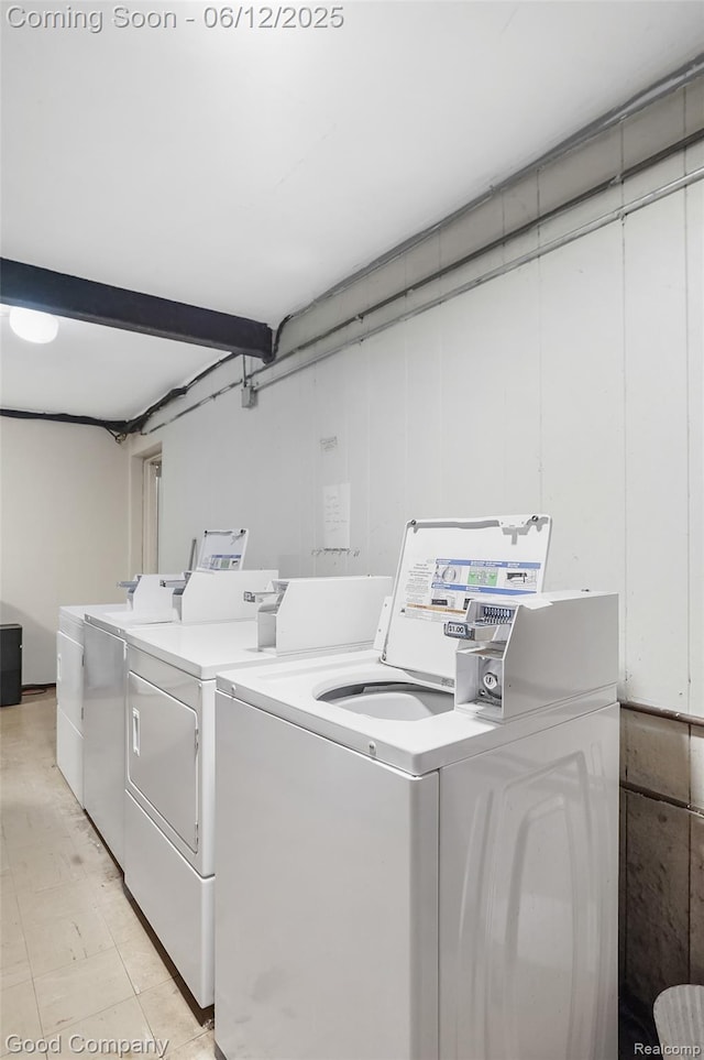 4345 Crooks Rd Unit 24, Royal Oak, MI 48073 - shared laundry room featuring washing machine and dryer and light flooring