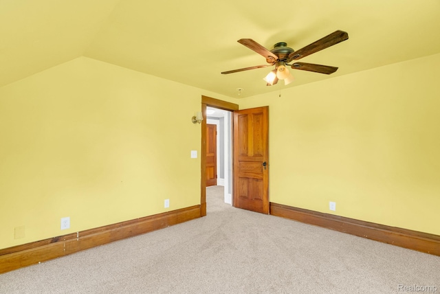 5276 Van Orden Rd, Webberville, MI 48892 - spare room featuring a ceiling fan, baseboards, carpet flooring, and lofted ceiling