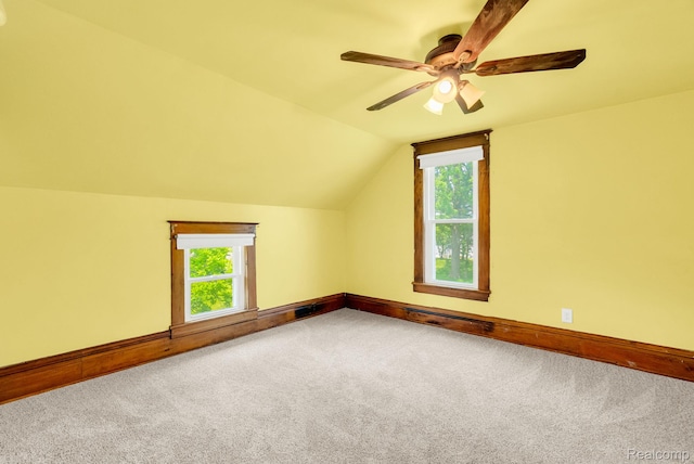5276 Van Orden Rd, Webberville, MI 48892 - additional living space featuring baseboards, carpet floors, ceiling fan, and lofted ceiling