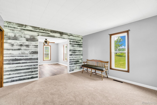 5276 Van Orden Rd, Webberville, MI 48892 - sitting room with an accent wall, carpet floors, wallpapered walls, and baseboards