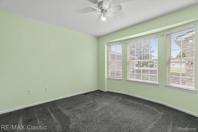 48728 Sundance Ct, Shelby Twp, MI 48315 - unfurnished room featuring ceiling fan and dark colored carpet