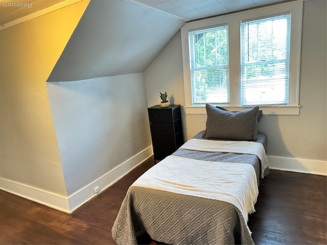 1202 Pershing St, Flint, MI 48503 - bedroom featuring vaulted ceiling and dark wood-type flooring