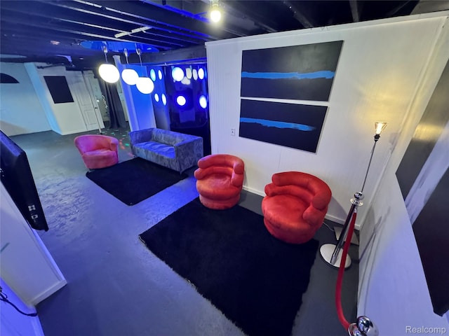 1202 Pershing St, Flint, MI 48503 - playroom featuring concrete flooring
