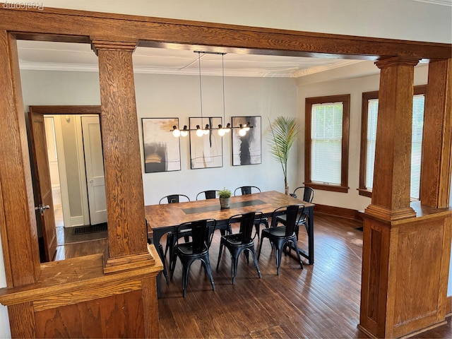 1202 Pershing St, Flint, MI 48503 - dining area with ornate columns, crown molding, and dark wood-style floors