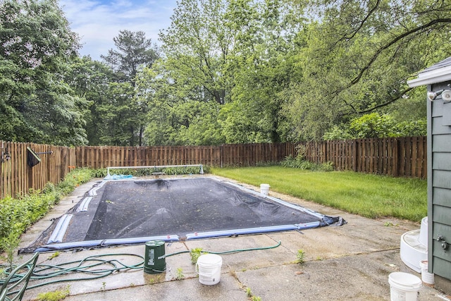51 Dunning Ave, Battle Creek, MI 49037 - view of swimming pool featuring a fenced backyard and a diving board
