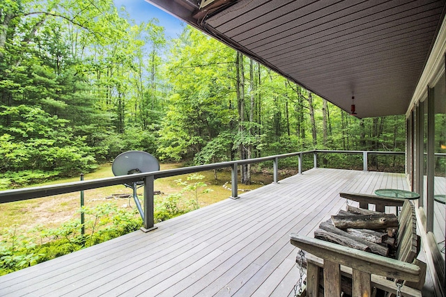 441 N Benson Rd, Fountain, MI 49410 - wooden deck with a wooded view