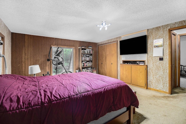 441 N Benson Rd, Fountain, MI 49410 - carpeted bedroom with a textured ceiling and wooden walls