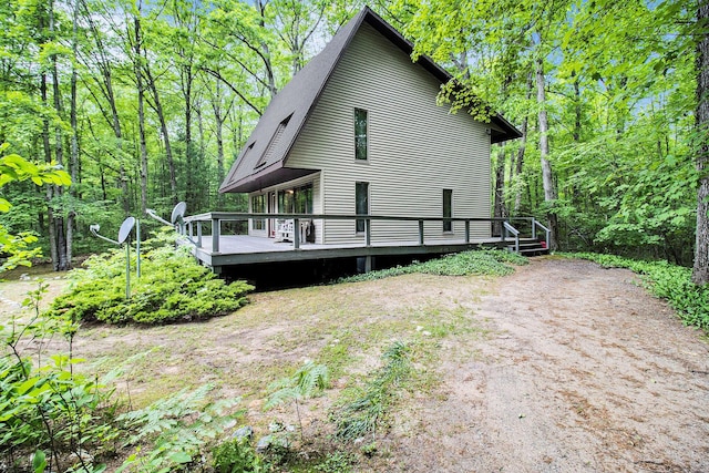 441 N Benson Rd, Fountain, MI 49410 - view of side of home with a deck