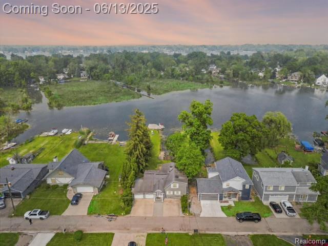 4967 Coshocton Dr, Waterford, MI 48327 - aerial view at dusk of a water view and a residential view
