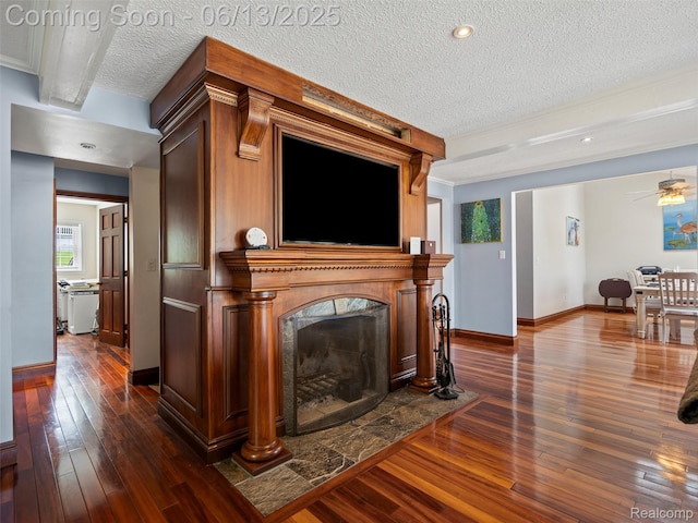 4967 Coshocton Dr, Waterford, MI 48327 - living room with a textured ceiling, dark wood finished floors, a high end fireplace, crown molding, and recessed lighting