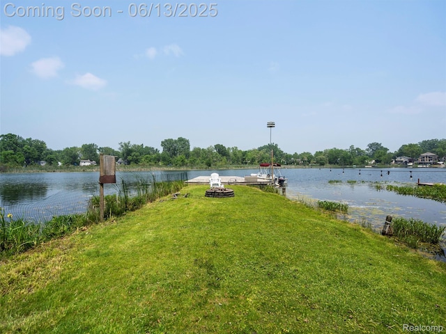 4967 Coshocton Dr, Waterford, MI 48327 - water view featuring a fire pit