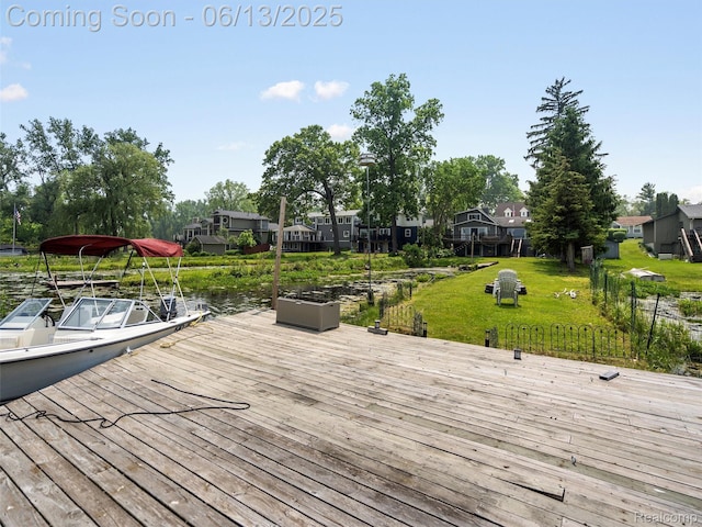 4967 Coshocton Dr, Waterford, MI 48327 - wooden terrace with a boat dock, a yard, and a residential view