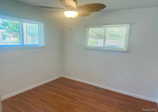 3461 Michael Ave, Warren, MI 48091 - spare room featuring plenty of natural light, wood finished floors, and a ceiling fan