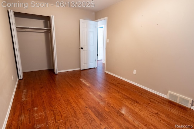 21806 Trombly St, Saint Clair Shores, MI 48080 - unfurnished bedroom featuring wood finished floors, baseboards, and a closet