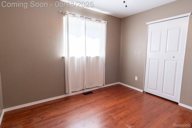 21806 Trombly St, Saint Clair Shores, MI 48080 - unfurnished bedroom featuring wood finished floors and baseboards