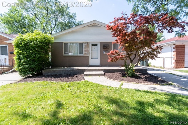 21806 Trombly St, Saint Clair Shores, MI 48080 - view of front of house with a front yard