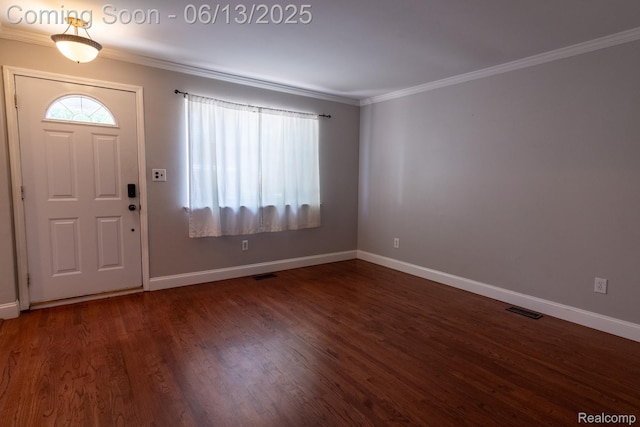 21806 Trombly St, Saint Clair Shores, MI 48080 - foyer entrance with ornamental molding, wood finished floors, and baseboards