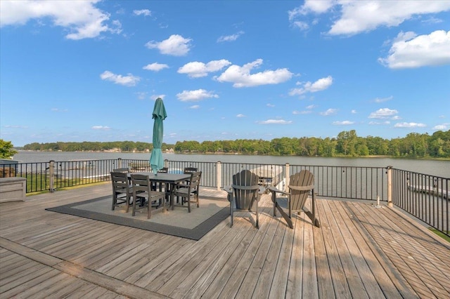 4823 Lakeside Blvd, Hale, MI 48739 - wooden deck with a water view and outdoor dining space