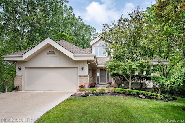 6524 Pleasant Lake Ct, West Bloomfield, MI 48322 - view of front of home featuring a garage, roof with shingles, brick siding, driveway, and a front yard