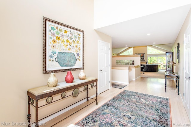 6524 Pleasant Lake Ct, West Bloomfield, MI 48322 - corridor with wood finished floors and recessed lighting