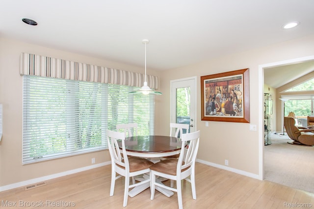 6524 Pleasant Lake Ct, West Bloomfield, MI 48322 - dining area with light wood-style flooring and baseboards