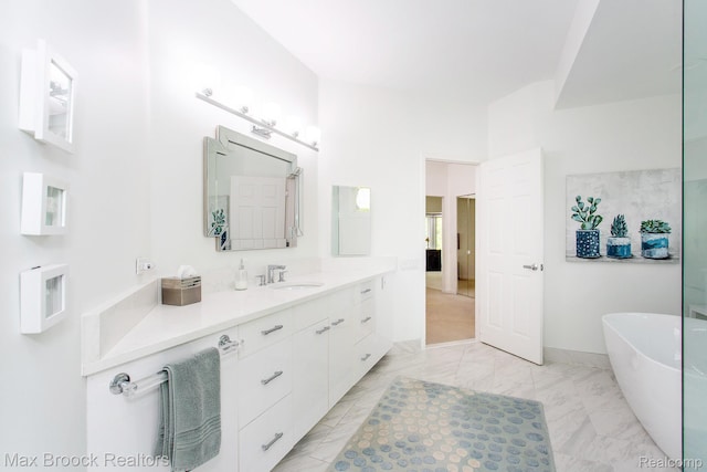 6524 Pleasant Lake Ct, West Bloomfield, MI 48322 - bathroom featuring vanity, a soaking tub, and marble finish flooring