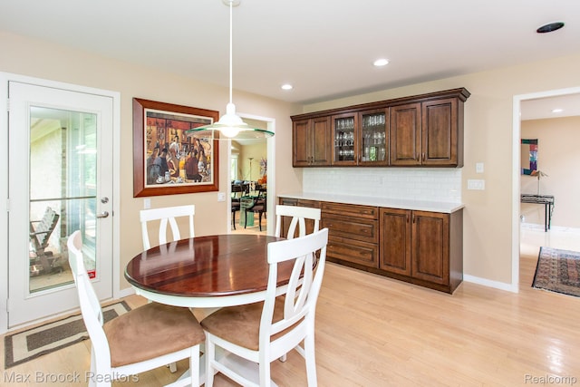 6524 Pleasant Lake Ct, West Bloomfield, MI 48322 - dining room with light wood-style flooring and recessed lighting