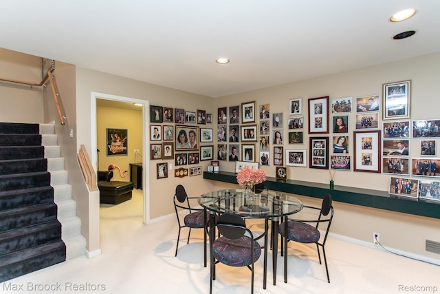 6524 Pleasant Lake Ct, West Bloomfield, MI 48322 - carpeted dining space with stairway and recessed lighting