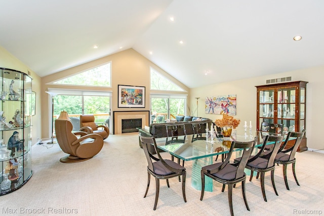 6524 Pleasant Lake Ct, West Bloomfield, MI 48322 - dining space with light colored carpet, high vaulted ceiling, a fireplace, and recessed lighting