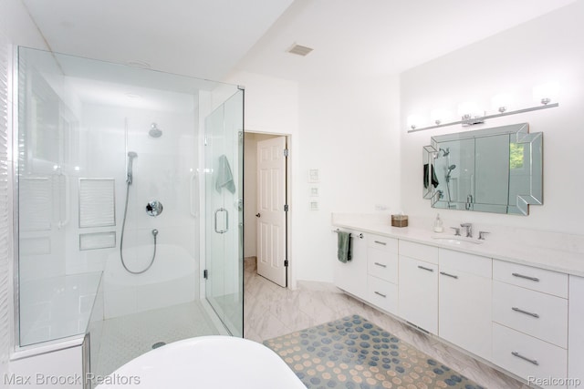 6524 Pleasant Lake Ct, West Bloomfield, MI 48322 - bathroom featuring a stall shower, vanity, marble look tile flooring, and a freestanding bath