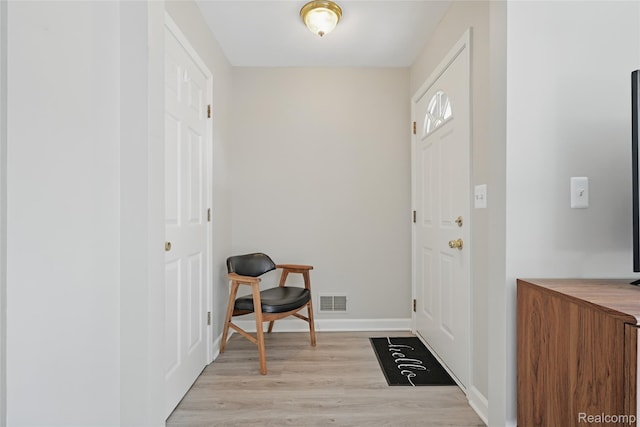 1372 Maryland St, Grosse Pointe, MI 48230 - foyer entrance featuring light wood-type flooring and baseboards