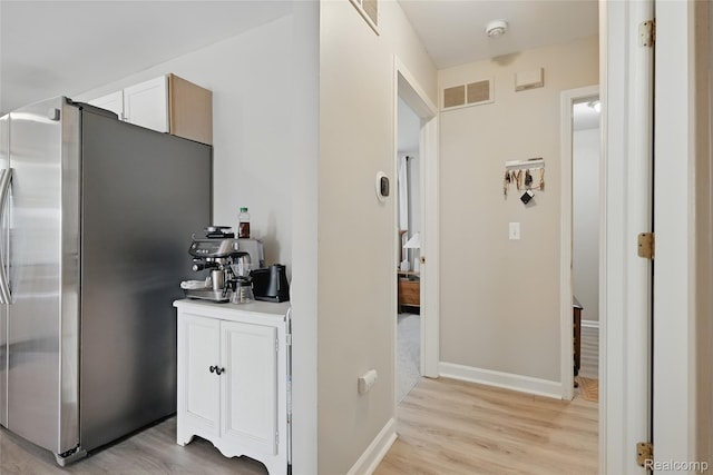 1372 Maryland St, Grosse Pointe, MI 48230 - hall with light wood-style floors and baseboards