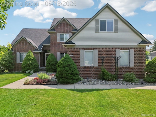 8329 Deer Creek Ct, Grand Blanc, MI 48439 - view of front of house with brick siding and a front yard