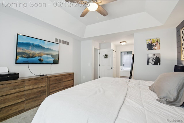 8329 Deer Creek Ct, Grand Blanc, MI 48439 - bedroom with a raised ceiling, ensuite bath, and ceiling fan