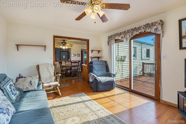 12818 Pomona Dr, Sterling Heights, MI 48312 - living room with a ceiling fan and wood finished floors